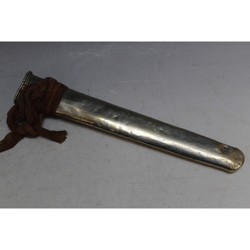 909 - A TIBETAN TYPE DAGGER AND SCABBARD, L 34 cmCondition Report:bumps to pommel and scabbard... 