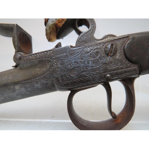 912 - AN EARLY FLINTLOCK CANNON BARREL MUFF PISTOL, engraved embellishment and marked 'T. Smith', overall ... 