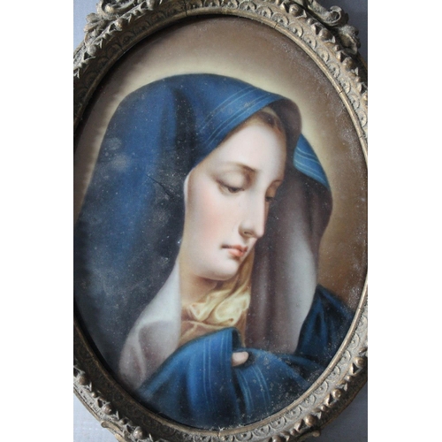 302 - A 19TH CENTURY OVAL PORCELAIN PLAQUE DEPICTING A YOUNG LADY IN A BLUE HOODED CLOAK, gilt frame. bear... 