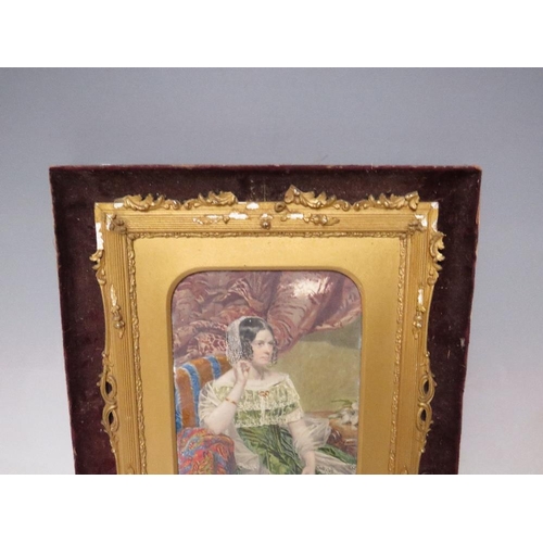 258 - (XIX). Study in ivory of an interior scene with seated elegant lady, unsigned, framed, 20 x 14.5 cm