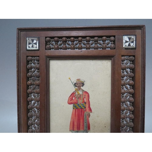 264 - (XIX). A miniature study of an Indian gentleman with parasol, unsigned, watercolour on paper, framed... 