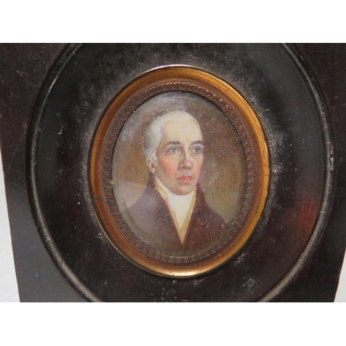 270 - (XVIII-XIX). An oval portrait miniature on ivory of a gentleman with white stock, unsigned, framed a... 