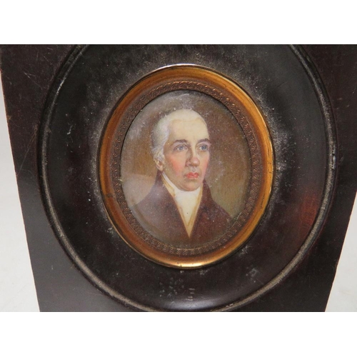 270 - (XVIII-XIX). An oval portrait miniature on ivory of a gentleman with white stock, unsigned, framed a... 