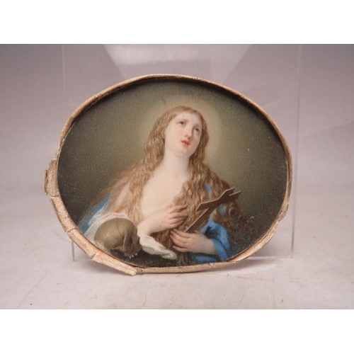 279 - (XIX). An oval portrait miniature on ivory of a young woman holding a cross and looking heavenwards,... 