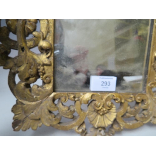 293 - A LATE 18TH EARLY 19TH CENTURY CARVED WOODEN DECORATIVE GOLD FRAME, containing an early piece of mir... 