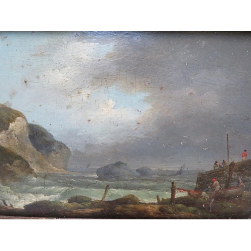 31 - (XIX). A stormy rocky coastal scene with figures and boats, unsigned, oil on panel, framed, 12 x 16 ... 