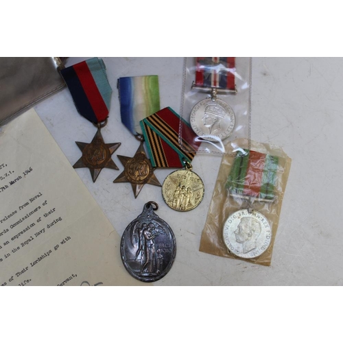 907 - WWII NAVEL MEDALS AND COLLECTABLES FROM LIEUTENANT R.C.JONES JX278831 R.N.V.R, to include the certif... 