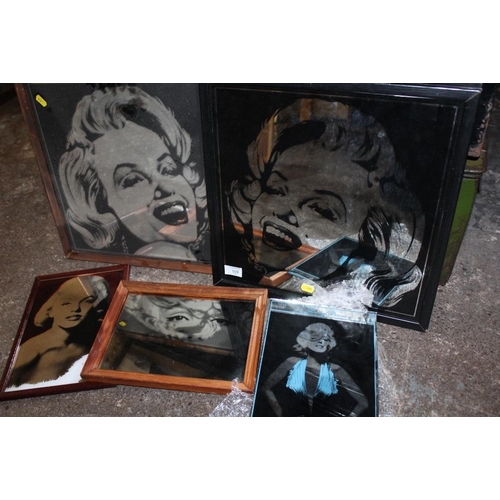 109 - FOUR FRAMED MARILYN MONROE RELATED MIRRORS, TOGETHER WITH AN UNFRAMED EXAMPLE (5)