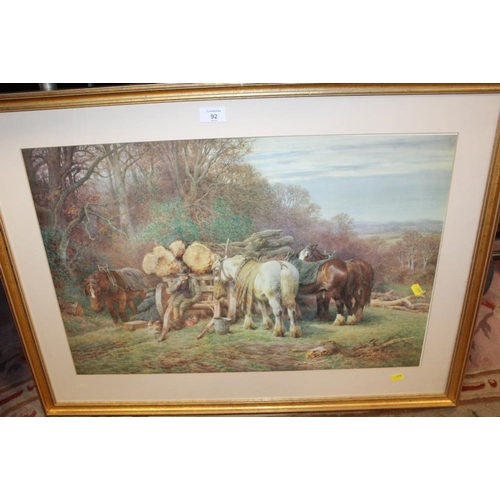 92 - A FRAMED AND GLAZED PRINT OF A WOOD CARTING SCENE BY CHARLES J ADAMS 45CM X 68CM