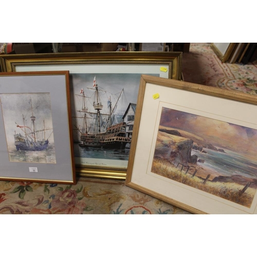 96 - A FRAMED AND GLAZED WATERCOLOUR DEPICTING A GALLEON AT SEA, TOGETHER WITH A PASTEL OF A COASTAL SCEN... 
