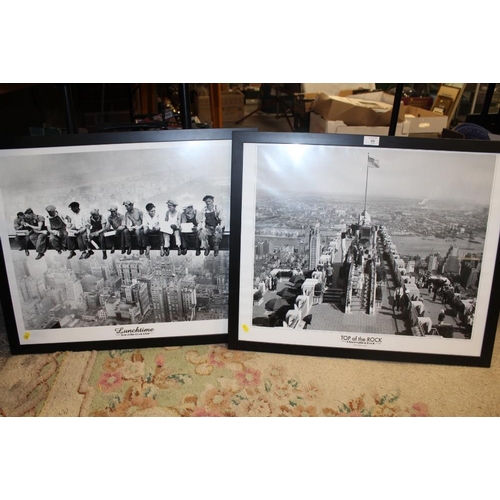 99 - A PAIR OF MODERN FRAMED AND GLAZED BLACK AND WHITE PRINTS 'TOP OF THE ROCK' AND 'LUNCHTIME'
