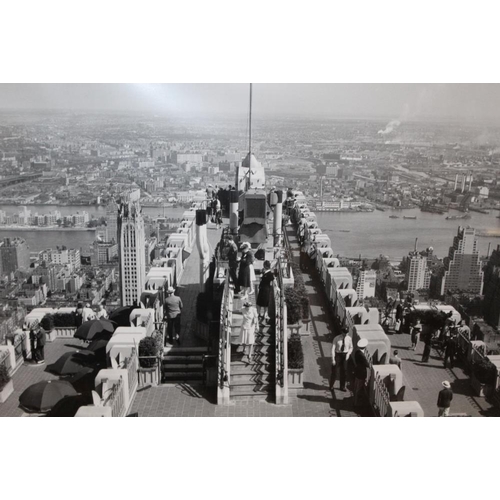 99 - A PAIR OF MODERN FRAMED AND GLAZED BLACK AND WHITE PRINTS 'TOP OF THE ROCK' AND 'LUNCHTIME'