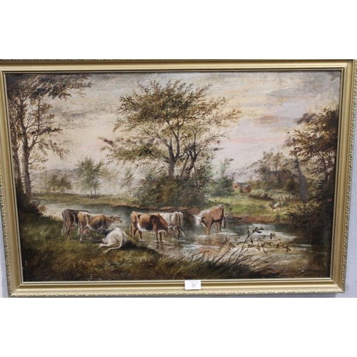 30 - AN ANTIQUE GILT FRAMED OIL ON CANVAS DEPICTING CATTLE WATERING IN A COUNTRY LANDSCAPE SIGNED S.D BAG... 