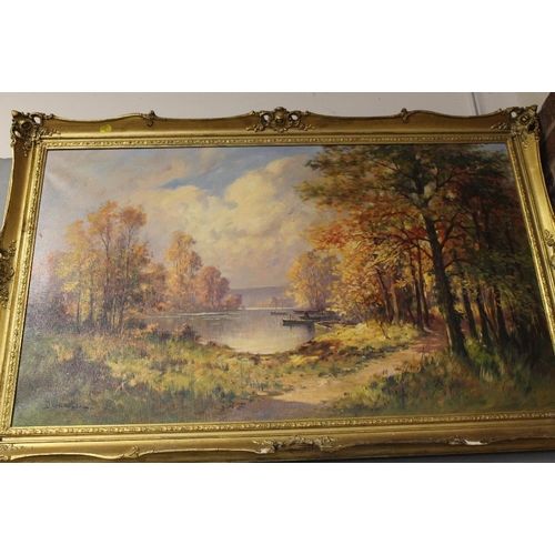 30 - A PAIR OF GILT FRAMED OIL ON CANVASES DEPICTING COUNTRY LAKE SCENES SIGNED DEMESTER - H 59 CM BY 98 ... 