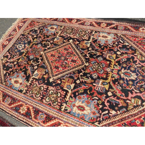 695 - TWO EARLY 20TH CENTURY RED/PINK WOOLLEN RUGS, LARGEST 208 X 136 CM , SMALLEST 163 X 96 CM(2)