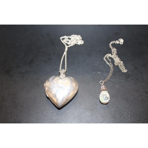 333 - A LARGE STERLING SILVER HEART SHAPED LOCKET ON CHAIN TOGETHER WITH A SILVER AND OPAL PENDANT ON CHAI... 