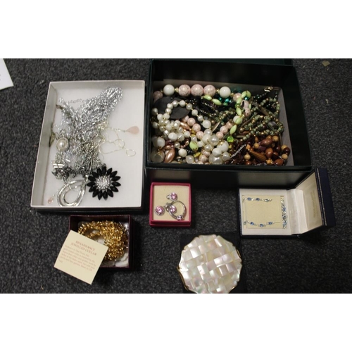 348 - TWO BOXES OF ASSORTED COSTUME JEWELLERY TO INCLUDE A RING, PENDANT AND EARRING SET ETC