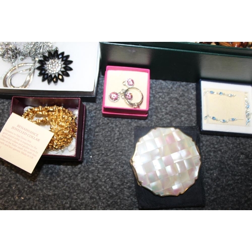 348 - TWO BOXES OF ASSORTED COSTUME JEWELLERY TO INCLUDE A RING, PENDANT AND EARRING SET ETC