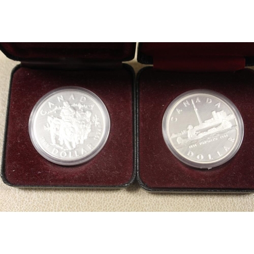 353 - THREE CASED SILVER CANADIAN DOLLAR PROOF COINS