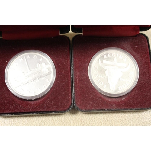 353 - THREE CASED SILVER CANADIAN DOLLAR PROOF COINS