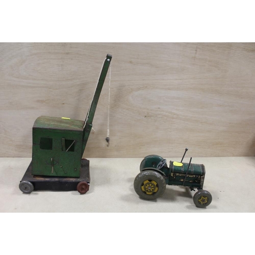 361 - A VINTAGE TINPLATE TRACTOR TOY TOGETHER WITH A VINTAGE TINPLATE CRANE