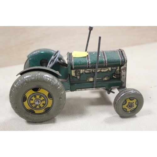 361 - A VINTAGE TINPLATE TRACTOR TOY TOGETHER WITH A VINTAGE TINPLATE CRANE