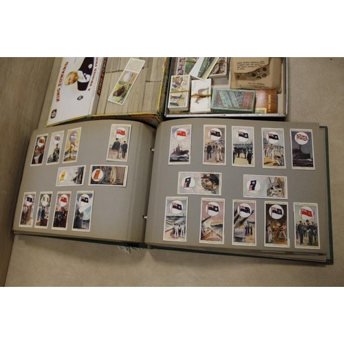 366 - A FOLDER OF VINTAGE CIGARETTE CARDS, TOGETHER WITH TWO BOXES OF LOOSE CIGARETTE CARDS AND TEA CARDS