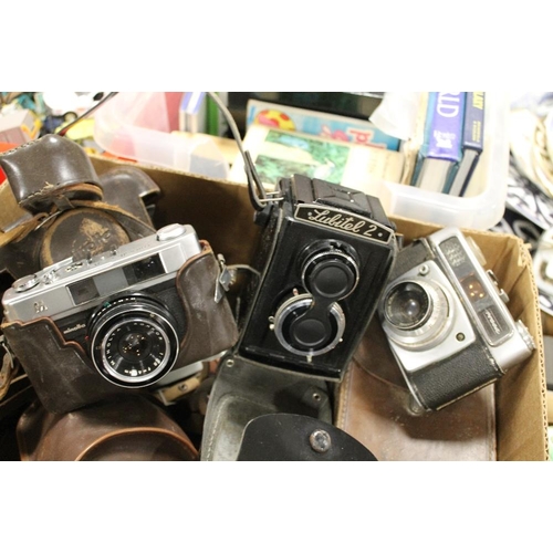 83 - TWO BOXED OF VINTAGE CAMERAS AND ACCESSORIES TO INCLUDE CORONET, NOMO, BROWNIE ETC