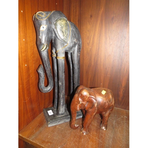 256 - TWO WOODEN INDIAN STYLE ELEPHANT FIGURES - TALLEST 50 CM