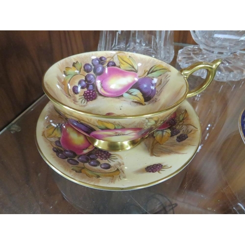 282 - TWO AYNSLEY ORCHARD GOLD TEA CUPS AND SAUCERS WITH FRUIT PATTERN INTERIORS