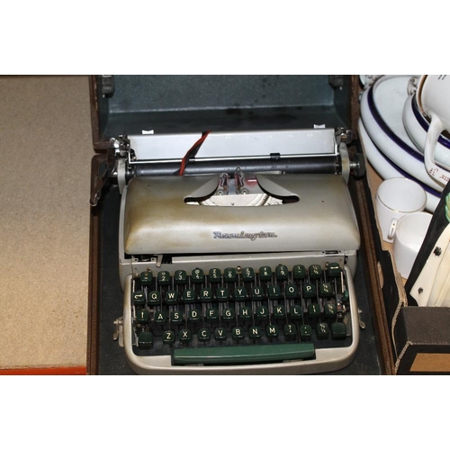 193 - A CASED VINTAGE REMINGTON TYPEWRITER