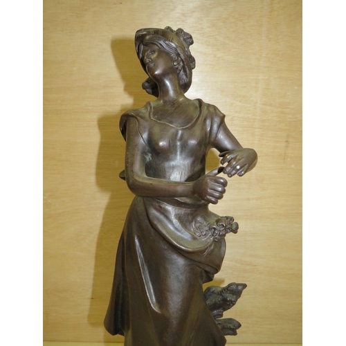 241 - A BRONZE FIGURE OF A LADY ON MARBLE PLINTH - H 49 CM