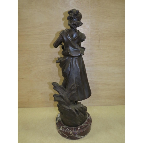 241 - A BRONZE FIGURE OF A LADY ON MARBLE PLINTH - H 49 CM