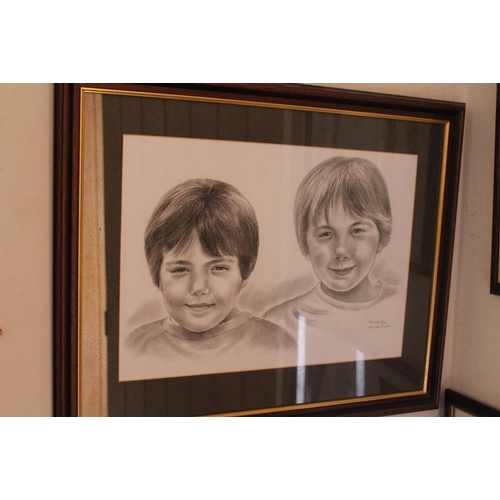 41 - A FRAMED AND GLAZED CHARCOAL STUDY OF A GENTLEMAN TOGETHER WITH A PENCIL PORTRAIT STUDY OF CHILDREN ... 