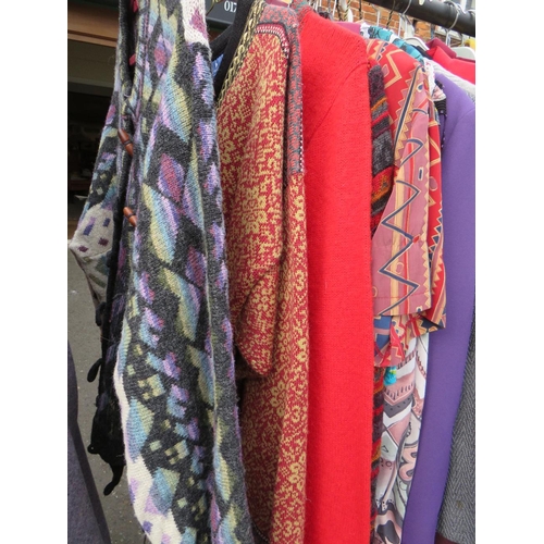 62 - A RAIL OF LADIES VINTAGE AND MODERN CLOTHING TO INCLUDE A SELECTION OF TWEED SKITS, MODERN AND VINTA... 