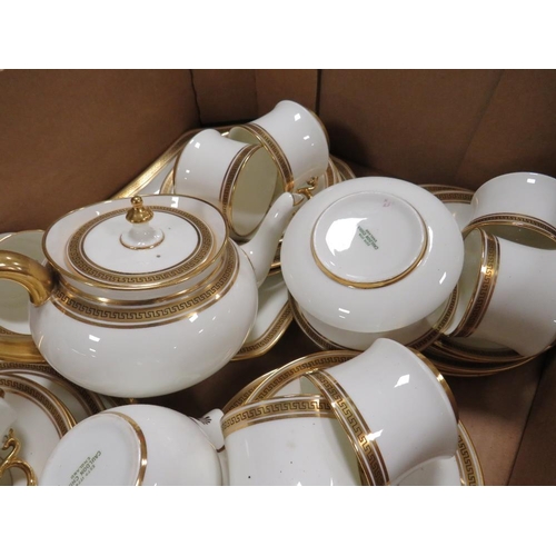 102 - A TRAY OF CAULDON GILT WHITE CHINA