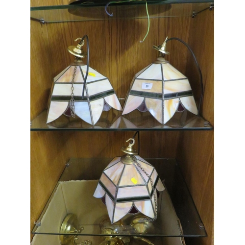 66 - A SET OF THREE TIFFANY STYLE LEADED GLASS CEILING LIGHTS