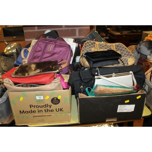 107 - TWO BOXES OF VINTAGE AND MODERN HANDBAGS AND DOCUMENT CASES ETC, TO INCLUDE EXAMPLES BY JANE SHILTON... 