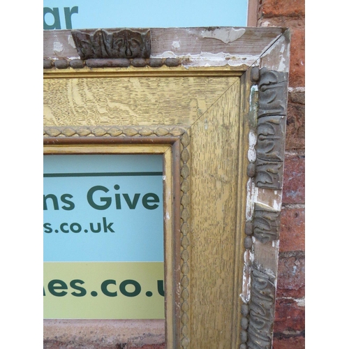 A 19TH CENTURY GILTWOOD 'WATTS' PICTURE FRAME, rebate 67. x 121 cm, S ...
