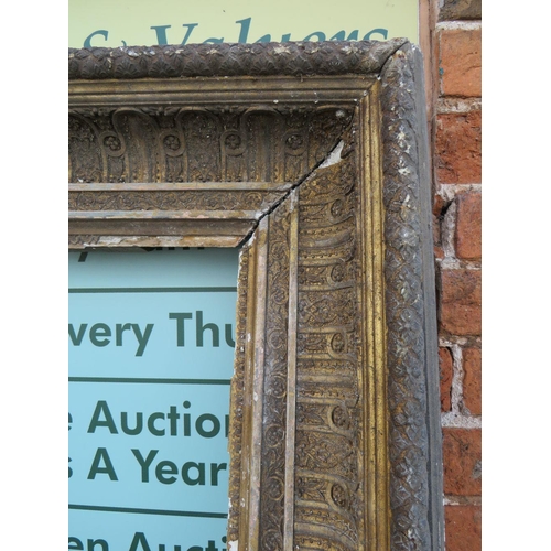 48 - A LARGE 19TH CENTURY GILTWOOD RECTANGULAR PICTURE FRAME, with moulded detail throughout, rebate 164 ... 