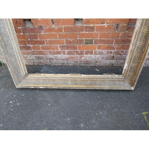 48 - A LARGE 19TH CENTURY GILTWOOD RECTANGULAR PICTURE FRAME, with moulded detail throughout, rebate 164 ... 