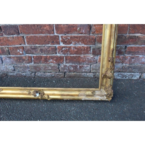 52 - A 19TH CENTURY GILT RECTANGULAR FRAME, with floral detail and acanthus moulded detail, rebate 71 x 1... 