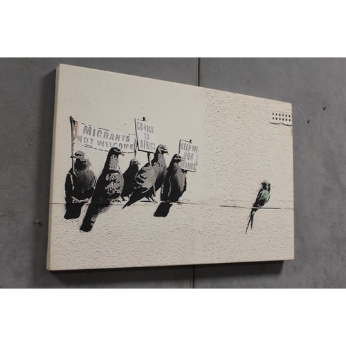 23 - A CANVAS PRINT OF A BANKSY PICTURE - H 51 CM W 77 CM