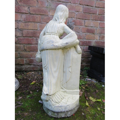 505 - A CONCRETE GARDEN FIGURE OF A WATER CARRIER - H 72 CM