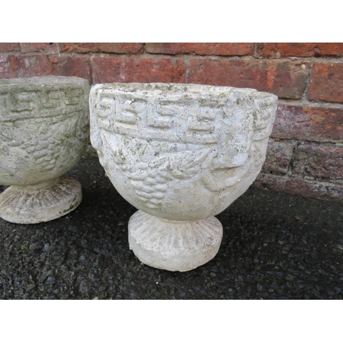 506 - TWO SMALL CONCRETE GARDEN PLANTERS H 23 CM