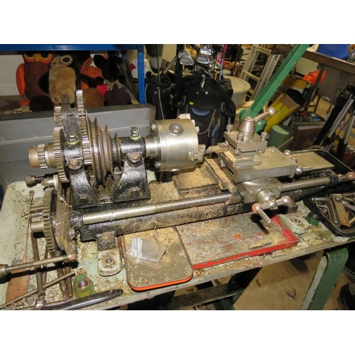 560 - A SMALL METAL WORKING LATHE ON METAL STAND