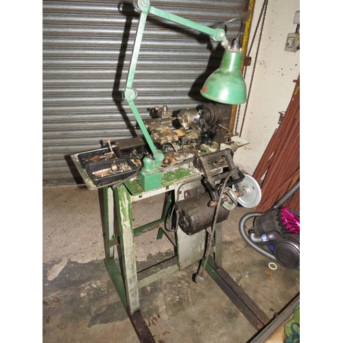 560 - A SMALL METAL WORKING LATHE ON METAL STAND