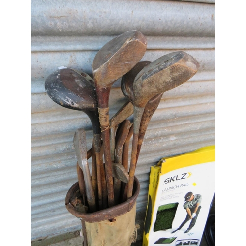 569 - A SET OF VINTAGE GOLF CLUBS, POWAKADDY TWINLINE 1 GOLF TROLLEY, CATCH NET, MAT AND BALLS