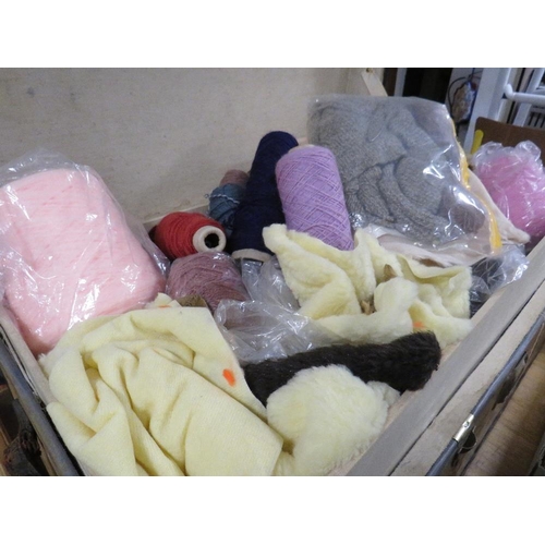 59 - A LARGE PACKING TRUNK AND CONTENTS COMPRISING TEXTILES, FABRIC PANELS. WOOL ETC