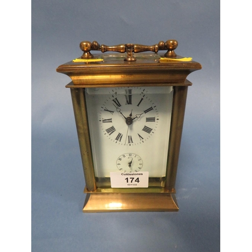 174 - A 20TH CENTURY BRASS CASED DUTCH REPEATER CARRIAGE CLOCK